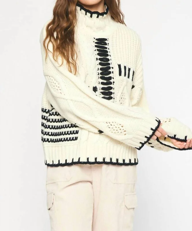 Cable Knit Turtleneck Sweater In Cream